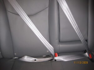 This is a latchplate stop on a seat belt, this is a button-style.